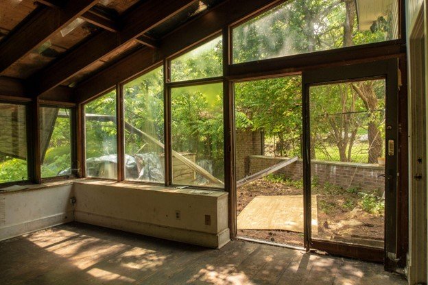 An unfinished patio enclosure underconstruction.
